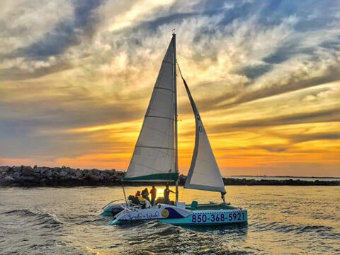sailboat during sunset