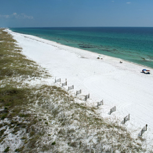 White sand beach and emerald water along Okaloosa Island near Fort Walton Beach