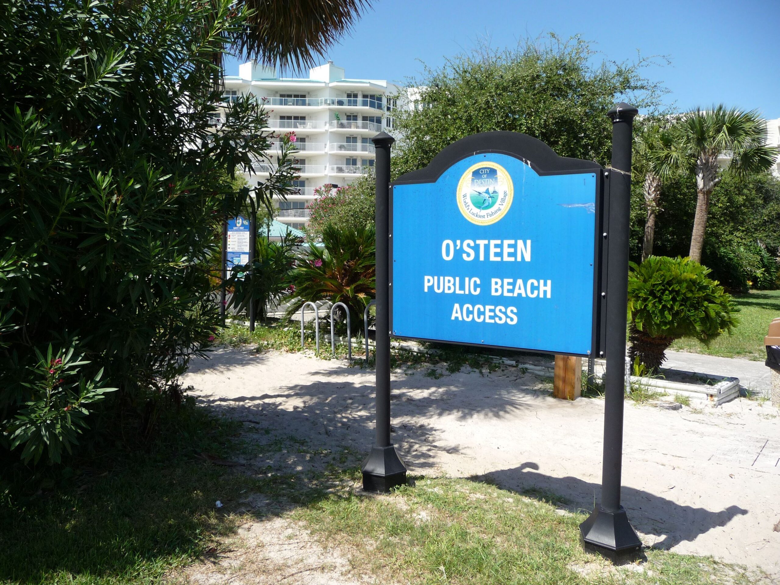 A sign for the public beach access.