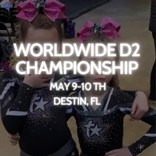 Two young girls in cheerleading uniforms with pink bows stand together. Overlay text reads "Worldwide D2 Championship, May 9-10th, Destin, FL.